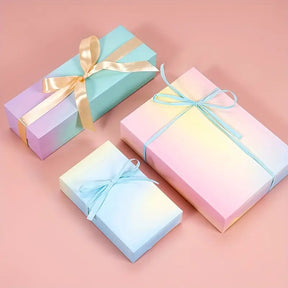Gift Wrapping: 3 Different Sizes Each with Ribbons and Gradient of Colour